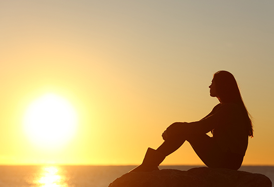 Pregnant silhouette at sunset